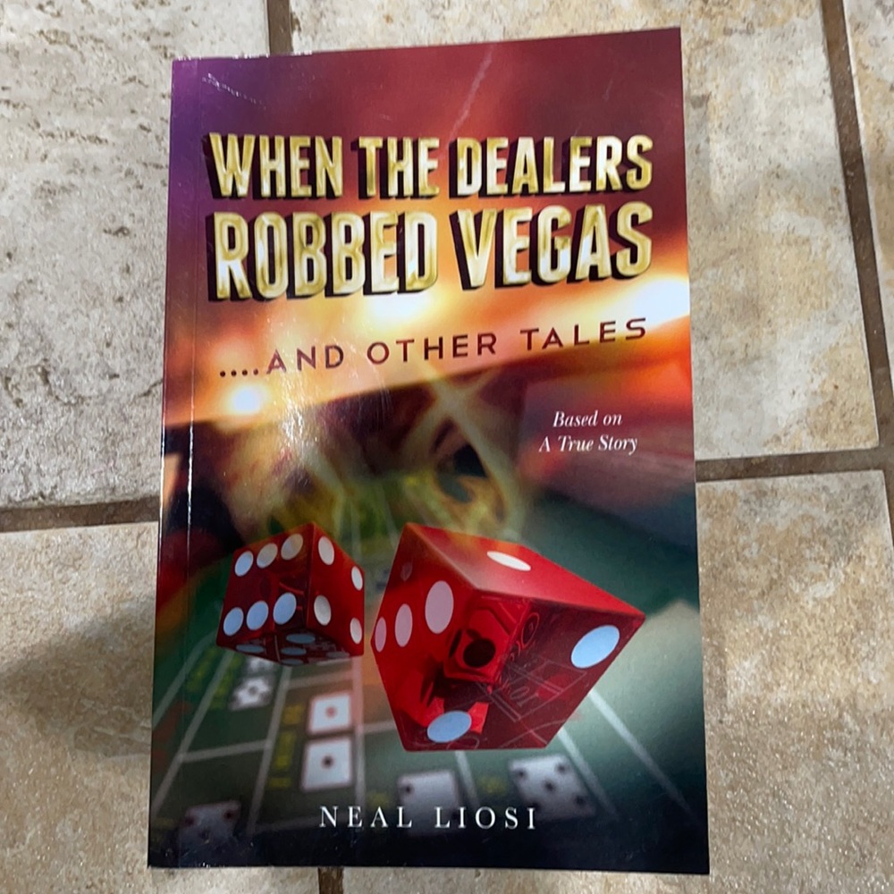 Signed copy of when the dealers robbed Vegas by Neal Liosi